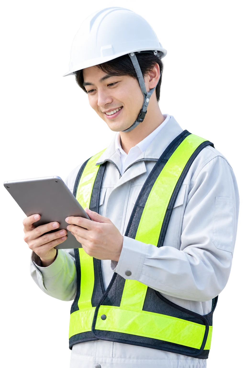 タブレットを見ながら作業を確認する若手の現場監督